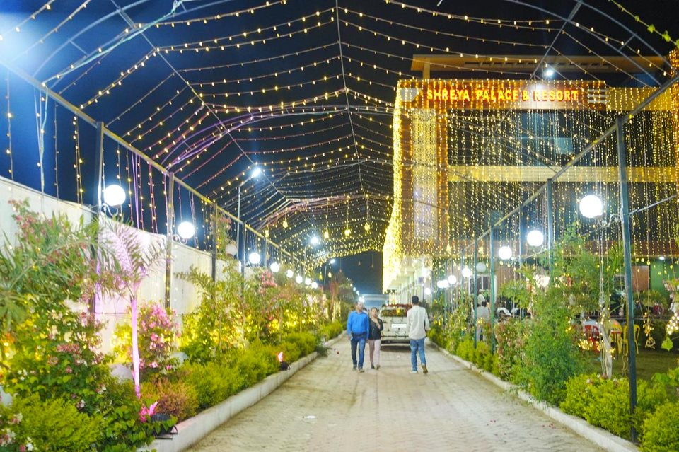 Fairy light illuminated canopy archway at Shreya Palace & Resort