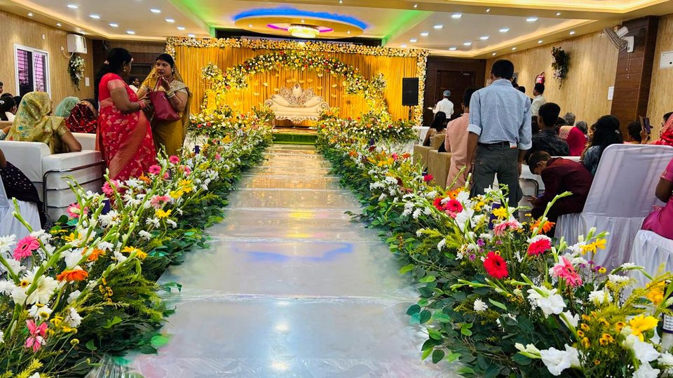 Floral aisle pathway decorated with fresh blossoms
