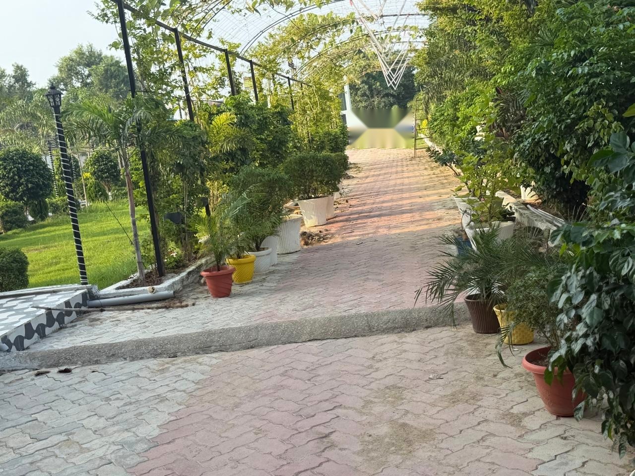 Garden trellis walkway for social events at Shreya Palace & Resort